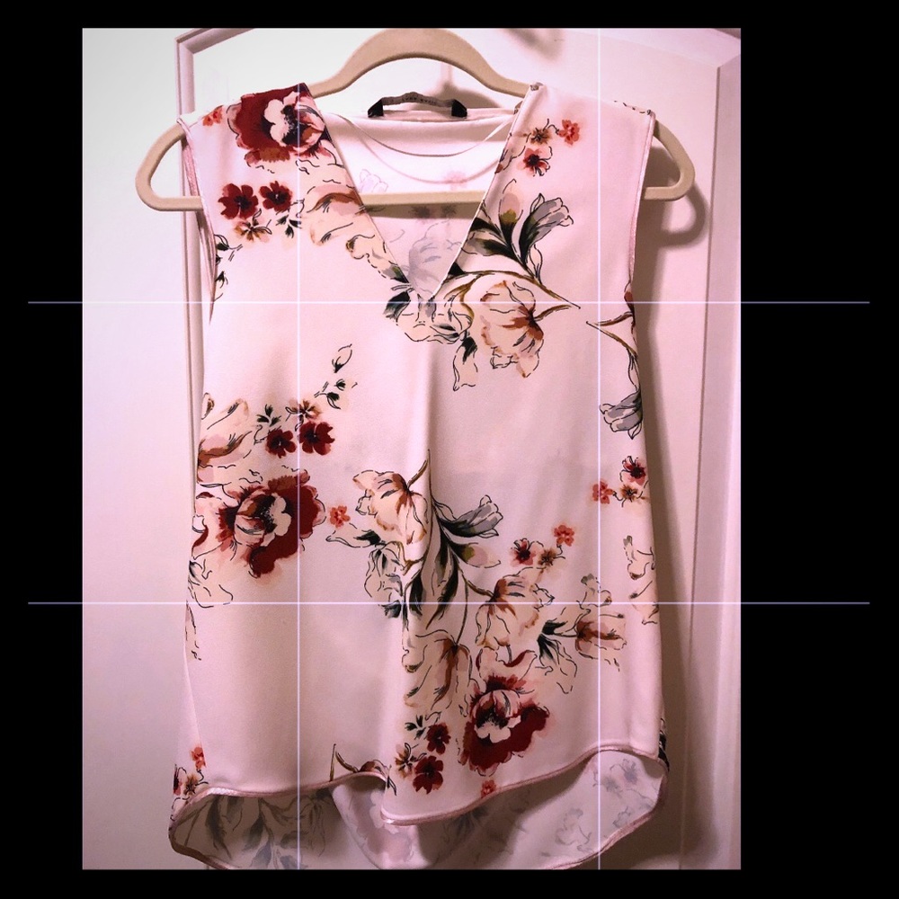 Sleeveless top with back drape